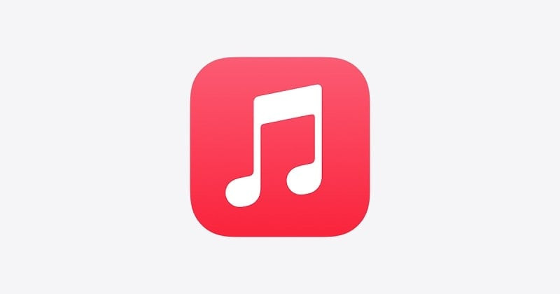 alt text: Giao diện ứng dụng Apple Music với nền đen và logo Apple Music màu trắng nổi bật.