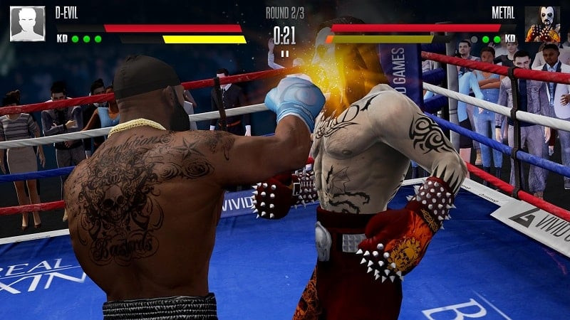 Two boxers face off in the ring in Real Boxing 2 MOD APK.