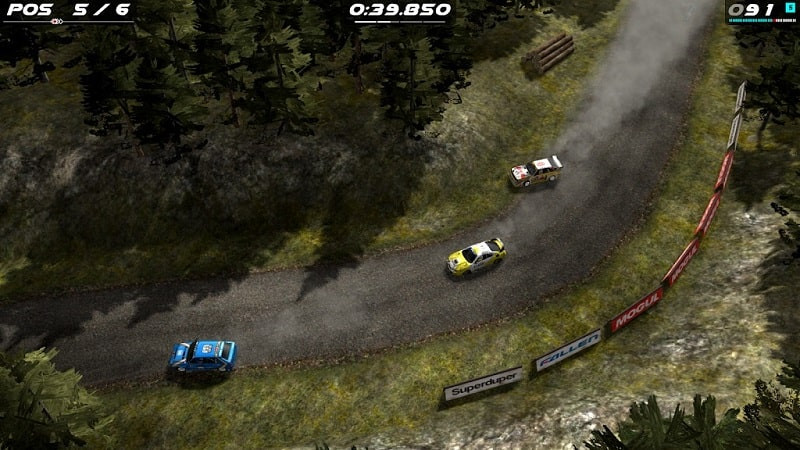 Rush Rally Origins screenshot showing a rally car speeding on a paved track.