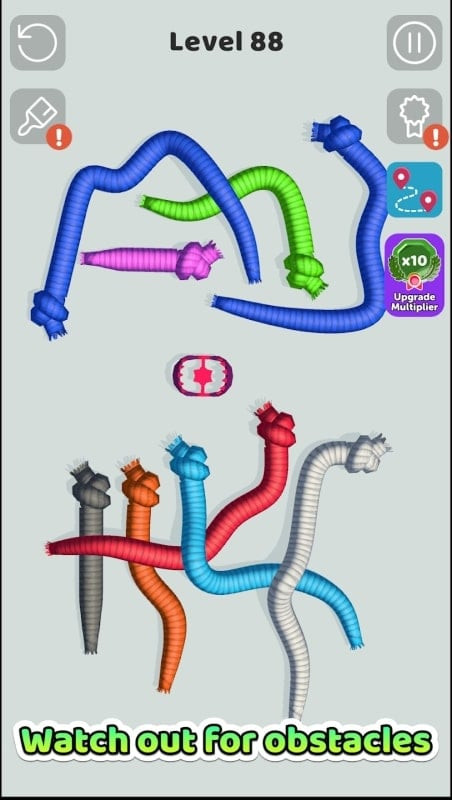 Tangled Snakes gameplay with obstacles